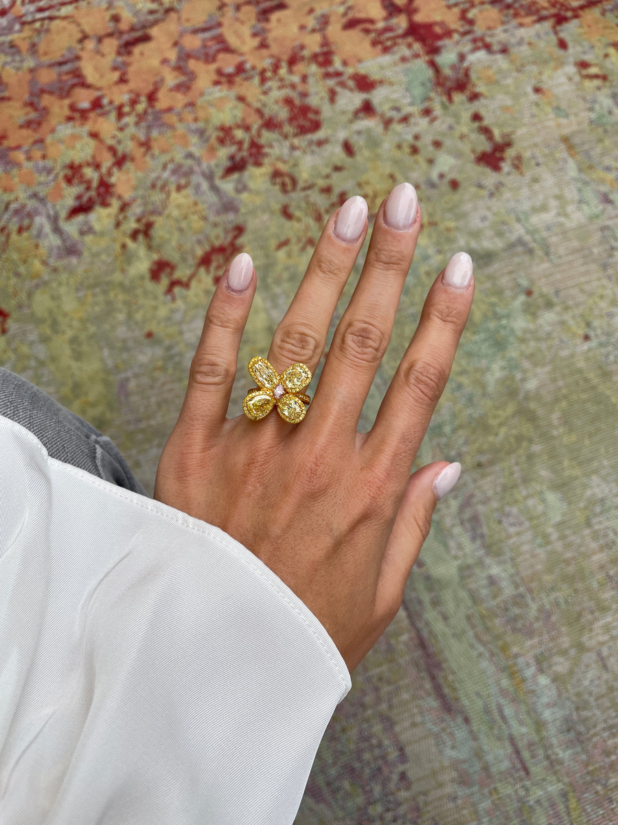 Flower ring set with intense yellow and pink diamonds