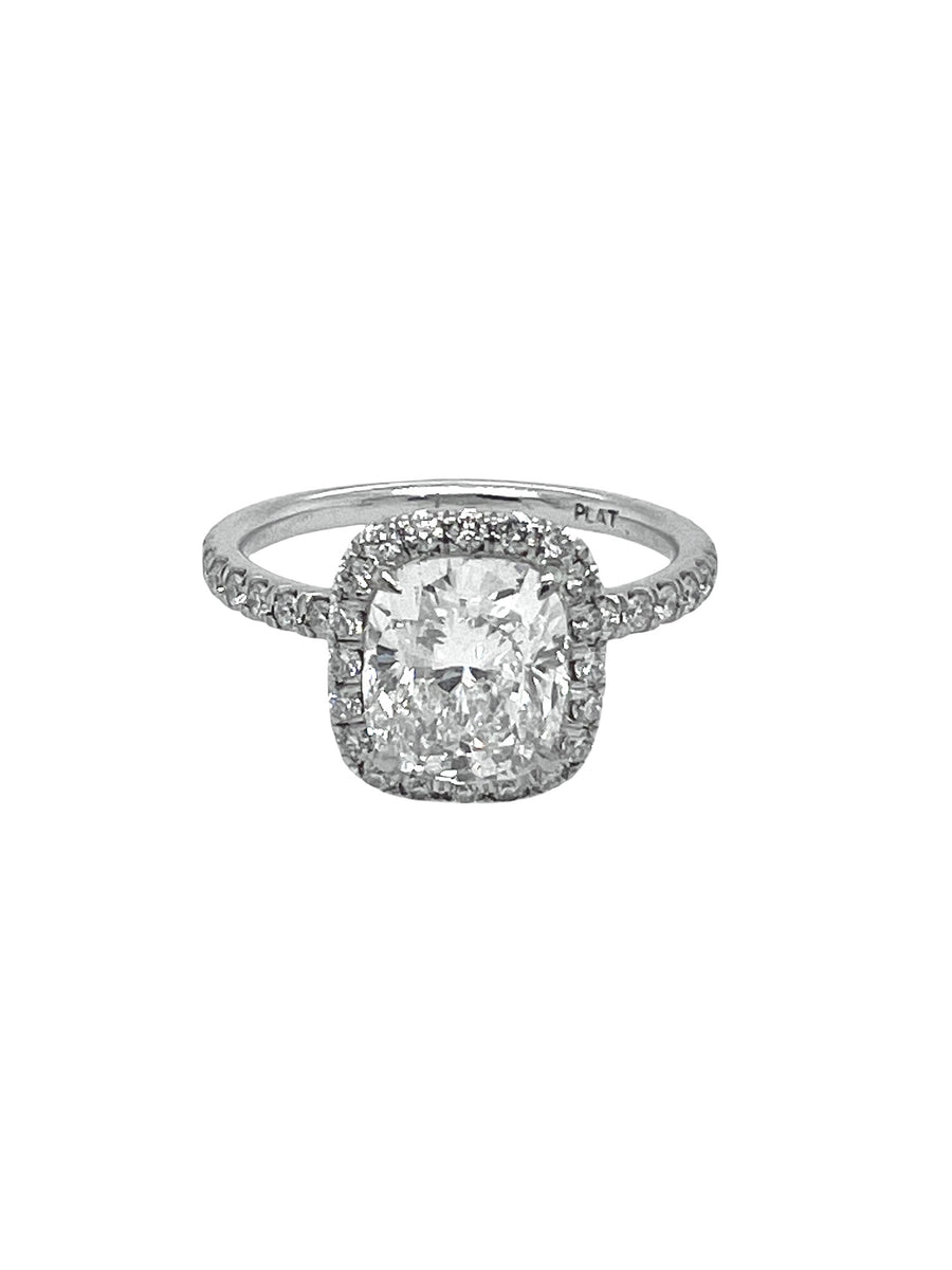 Cushion cut diamond ring with halo